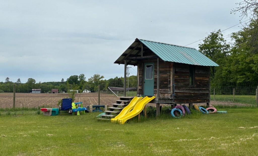 A small building raised on posts about a meter off the ground