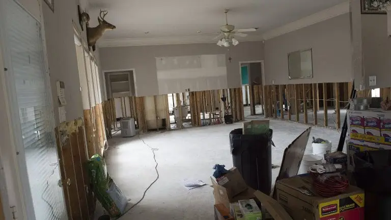 Flood damaged home in Louisiana with saturated drywall removed from the walls